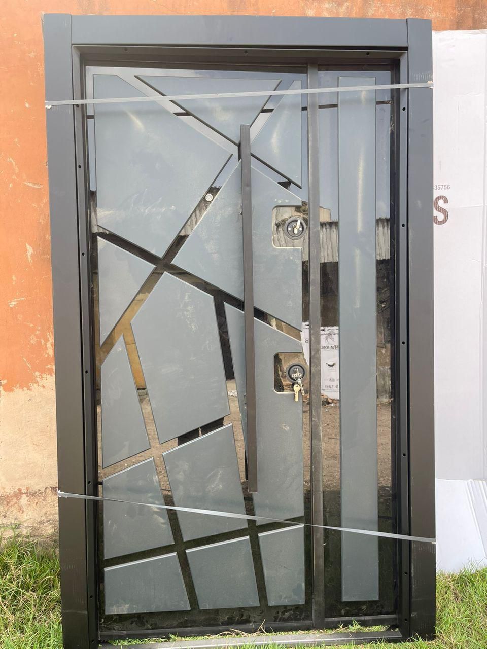 ANS0009 – Vertical Panel Security Door (Wood Accent with Bars)